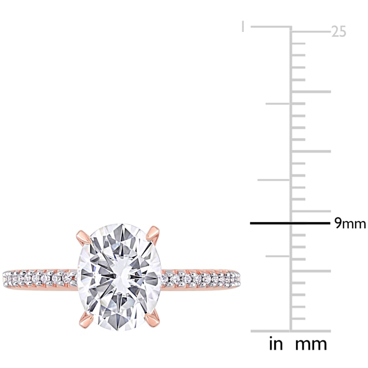 2 CT DEW Created Moissanite and 1/10 CT TW Diamond Engagement Ring in
14K Rose Gold