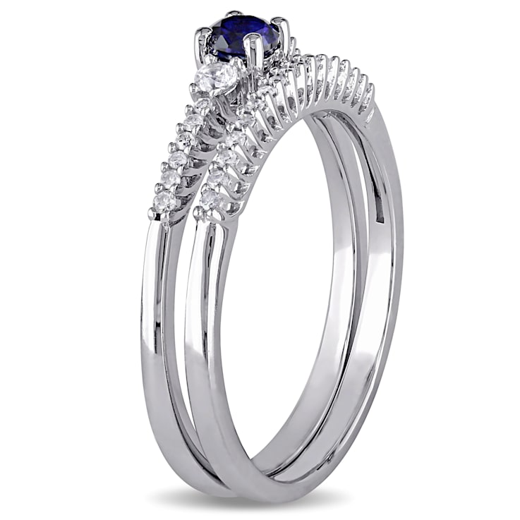 1/3 CTW Created Blue and Created White Sapphire with Diamond Accent Ring
Set in Sterling Silver