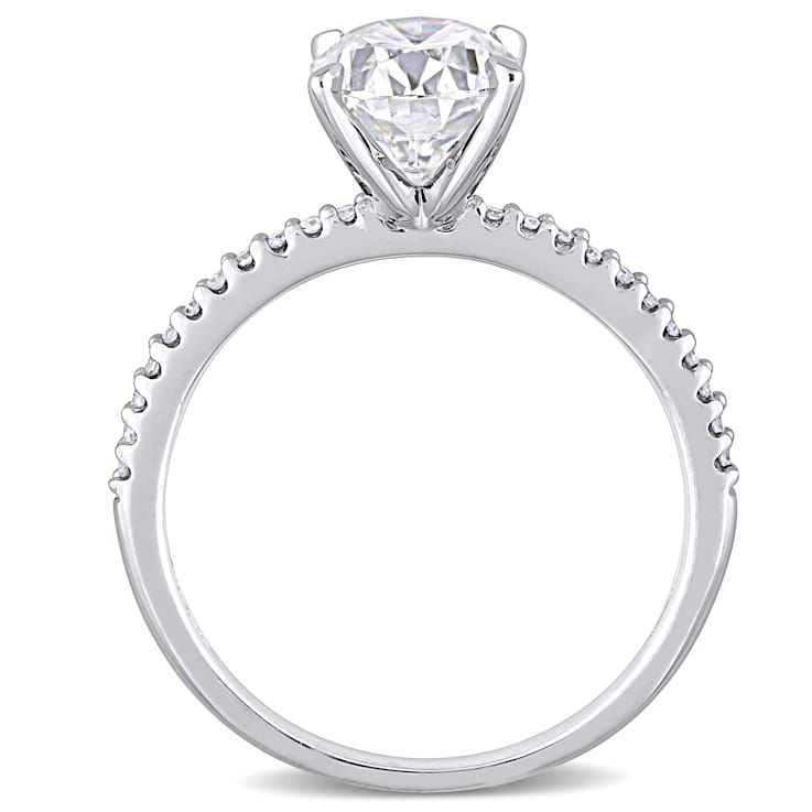 2 CT DEW Created Moissanite and 1/10 CT TW Diamond Engagement Ring in
14K White Gold