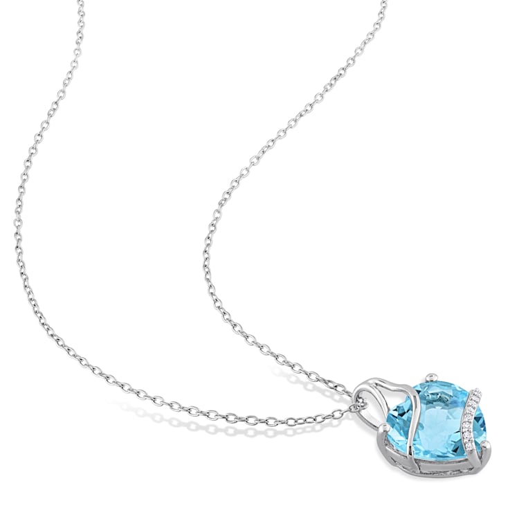7 CT TGW Sky Blue Topaz and Diamond Accent Heart Wrapped Pendant with
Chain in Sterling Silver