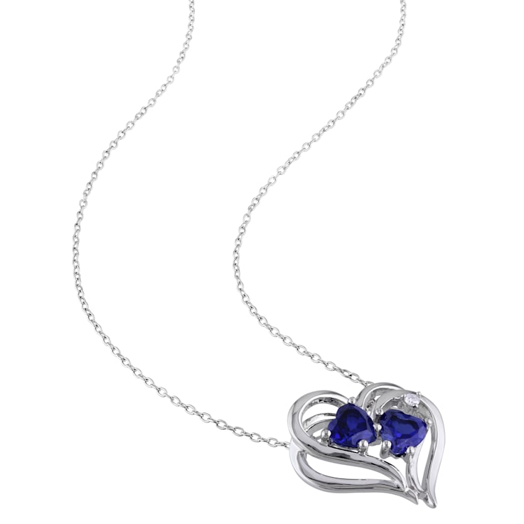 1 1/8 CT TGW Created Blue Sapphire and Diamond Accent Heart Pendant with
Chain in Sterling Silver