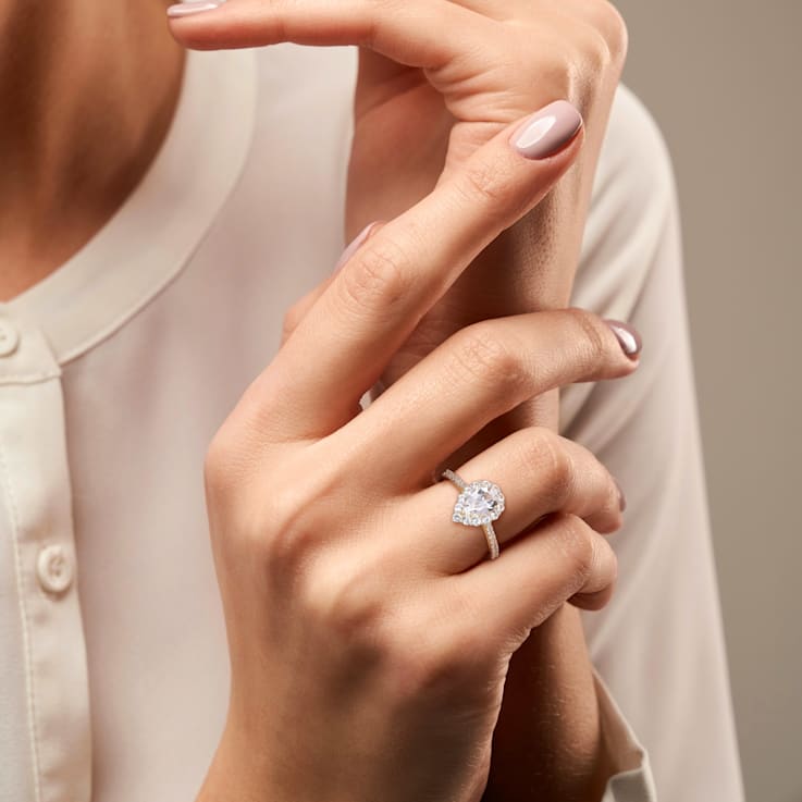 1 7/8 CT TGW Created White Sapphire Halo Teardrop Ring in Yellow Plated
Sterling Silver