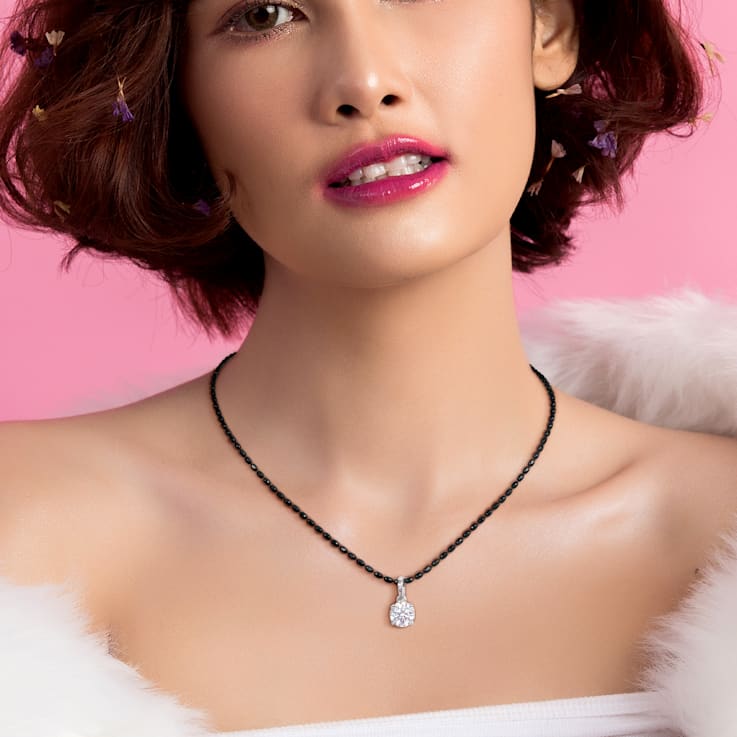 1 CT DEW Created Moissanite Solitaire Pendant, Diamond Cut Chain
Sterling Silver with Black Rhodium