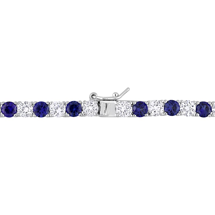33 CT TGW Created Blue and Created White Sapphire Tennis Necklace in
Sterling Silver