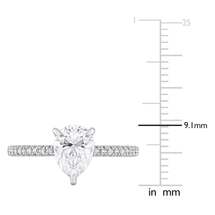 1-1/4 CT DEW Created Moissanite and 1/10 CT TW Diamond Engagement Ring
in 14K White Gold