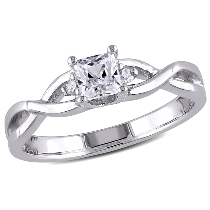 3/8 CT TGW Created White Sapphire and Diamond Accent Infinity Ring in
Sterling Silver