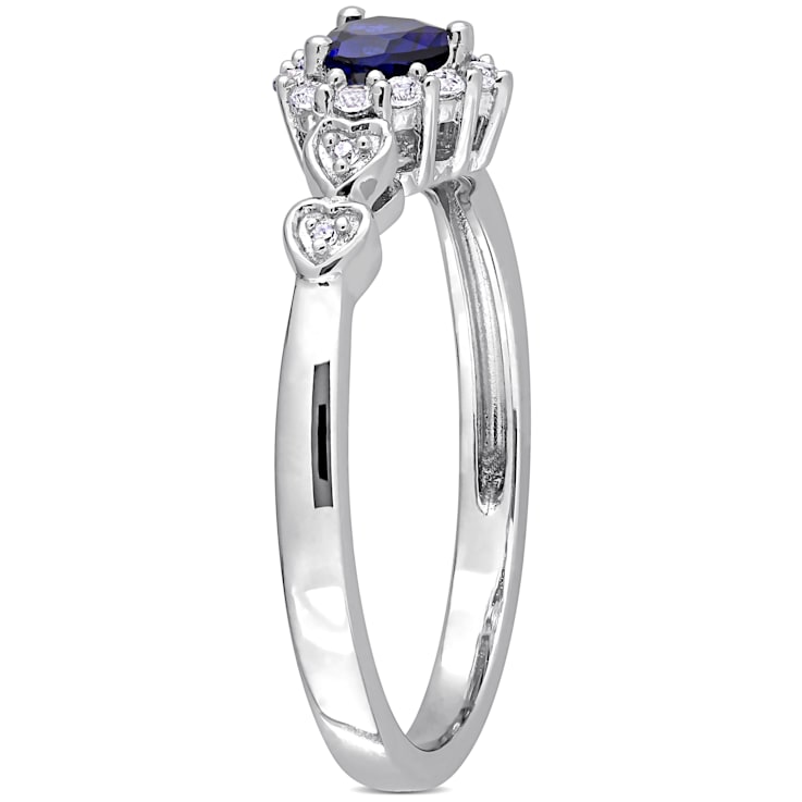 3/8 CT TGW Created Blue and White Sapphire, Diamond Accent Halo Ring in
Sterling Silver