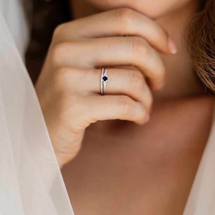 1/3 CTW Created Blue and Created White Sapphire with Diamond Accent Ring
Set in Sterling Silver