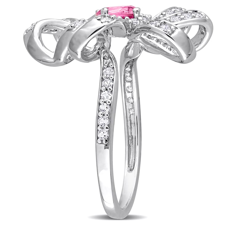 1 1/10 CT TGW Pink Topaz and White Topaz Flower Cocktail Ring in
Sterling Silver