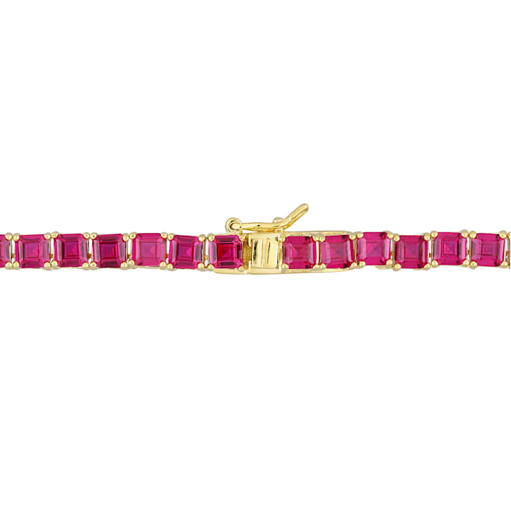 48 1/2 CT TGW Created Ruby Tennis Necklace in Yellow Gold Plated
Sterling Silver