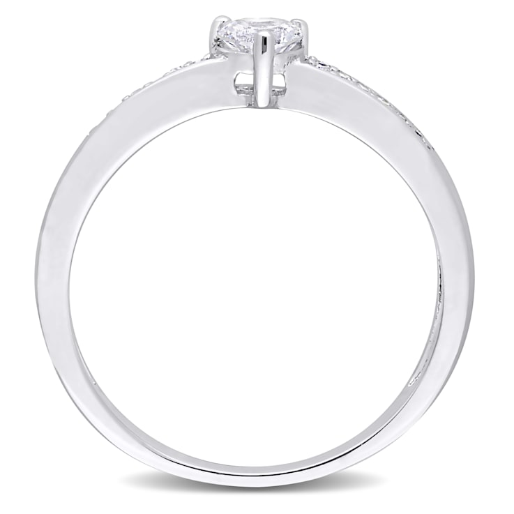 1/4 CT TGW Created White Sapphire and Diamond Accent Heart Ring in
Sterling Silver