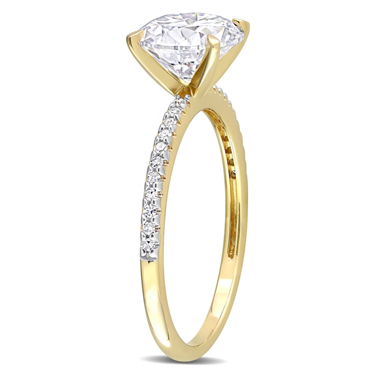 2 CT DEW Created Moissanite and 1/10 CT TW Diamond Engagement Ring in
14K Yellow Gold