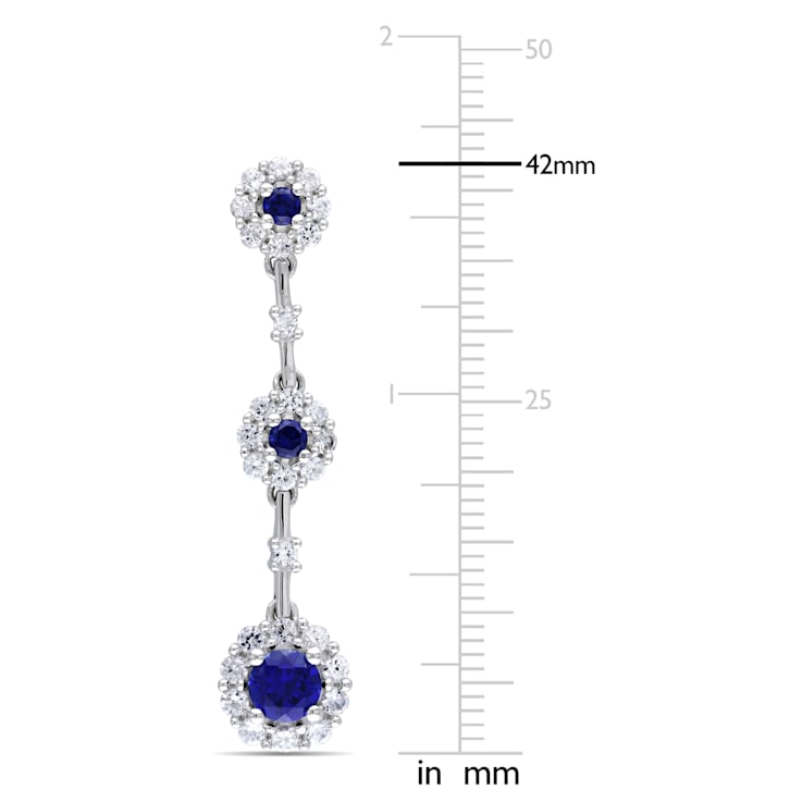 3 1/2 CT TGW Created Blue and White Sapphire Dangle Flower Earrings in
Sterling Silver