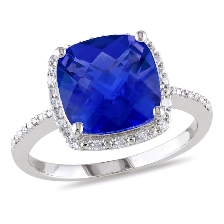5 3/4 CT TGW Created Blue Sapphire and 1/10 CT TW Diamond Halo Ring in
Sterling Silver