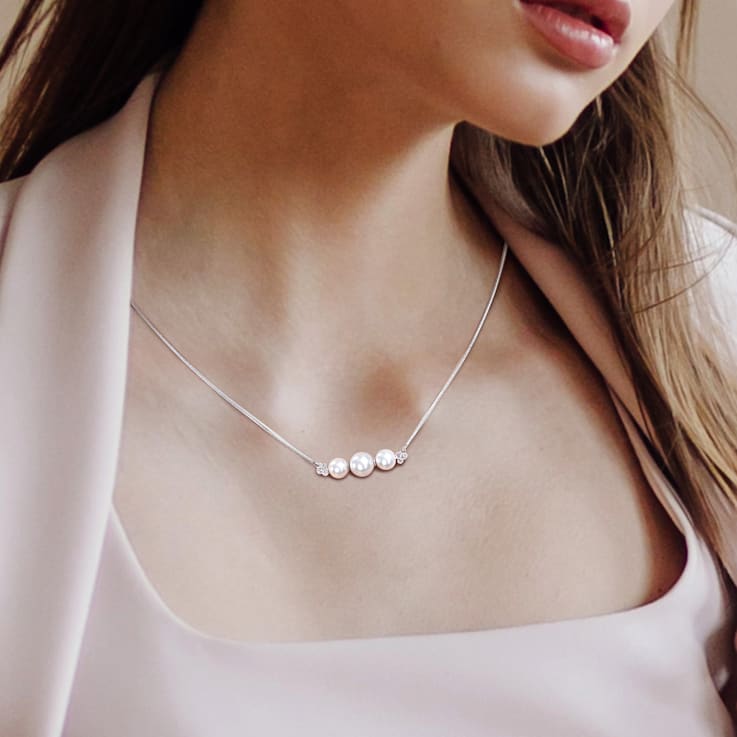 6-7.5MM Freshwater Cultured Pearl and 1/5 CT TGW Topaz Bar Necklace in
Sterling Silver