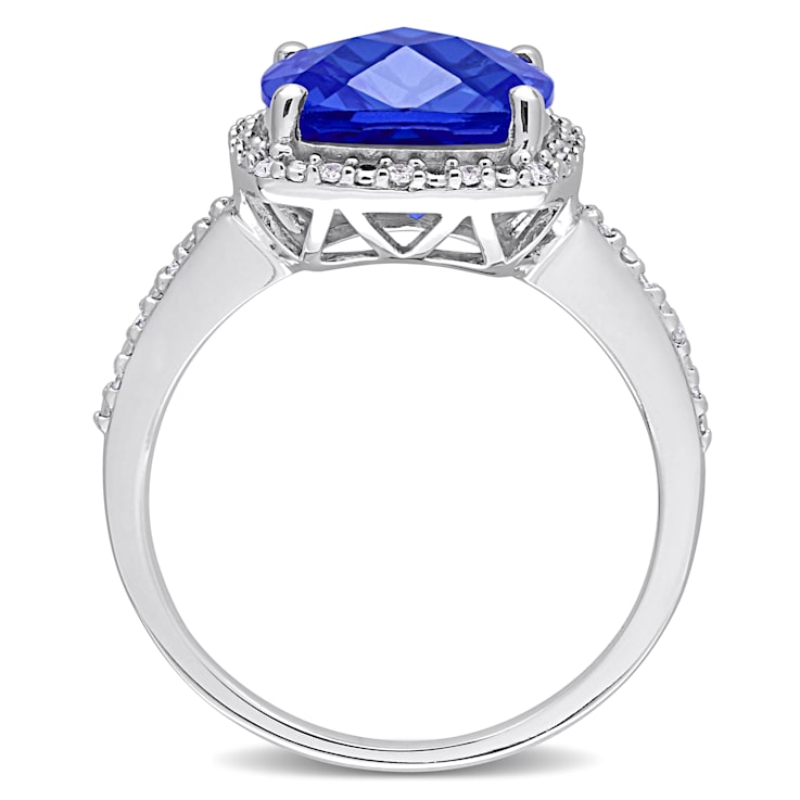 5 3/4 CT TGW Created Blue Sapphire and 1/10 CT TW Diamond Halo Ring in
Sterling Silver