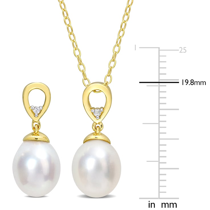 8-9MM South Sea Cultured Pearl & White Topaz Earrings & Pendant
Set in Yellow Plated Sterling Silver