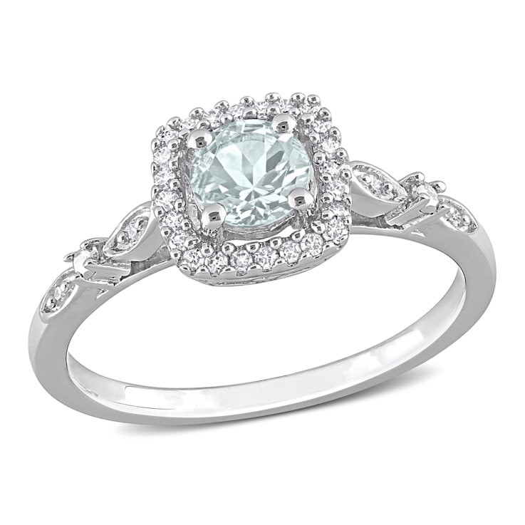 3/8 CT TGW Aquamarine and 1/10 CT TW Diamond Halo Ring in Sterling Silver