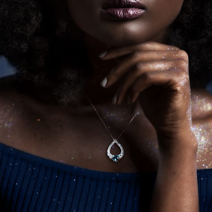 2 3/4 CTW London Blue and Sky Blue Topaz Graduated Open Teardrop
Sterling Silver Pendant with Chain