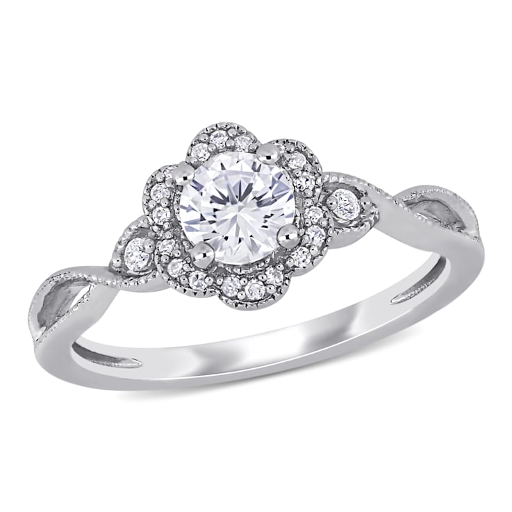 5/8 CT TGW Created White Sapphire and 1/10 CT TW Diamond Vintage Floral
Ring in Sterling Silver