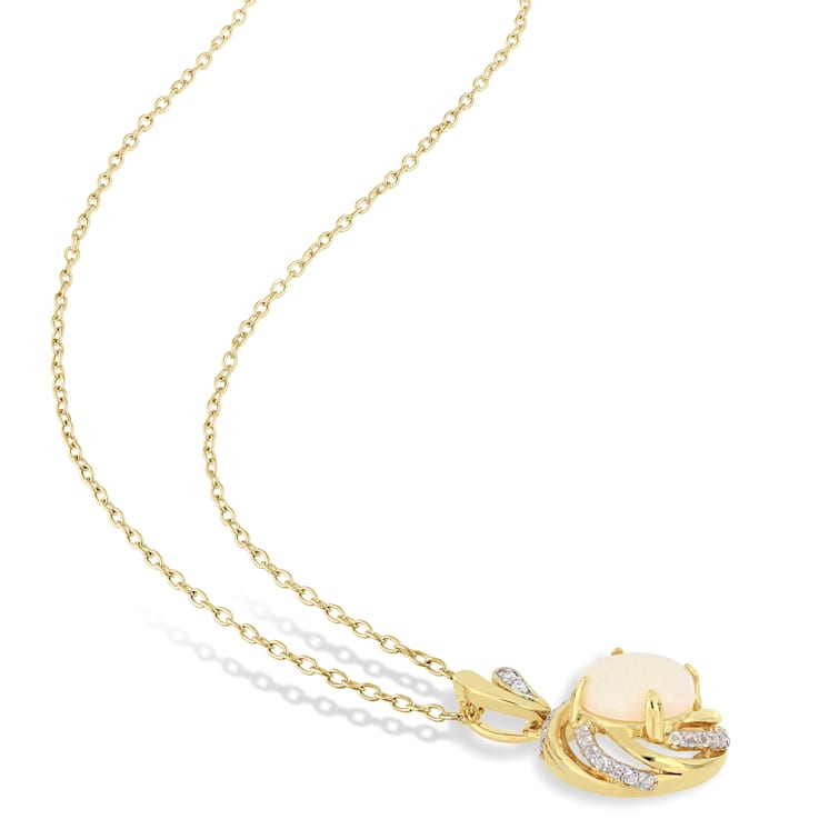 1 3/8 CT TGW Opal White Topaz and Diamond Accent Pendant With Chain in
Yellow Plated Sterling Silver