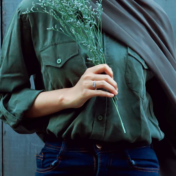 1 7/8 CT TGW Sky Blue Topaz and White Sapphire Halo Ring in Sterling Silver