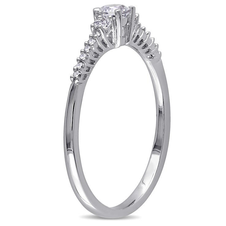 1/3 CT TGW Created White Sapphire and Diamond Accent Engagement Ring in
Sterling Silver