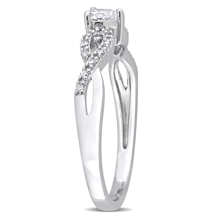 1/4 CT TGW Created White Sapphire and 1/10 CT TW Diamond Infinity
Engagement Ring in Sterling Silver