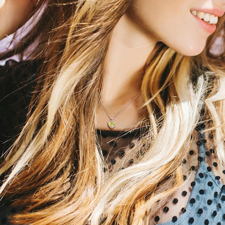 1 1/3 CT TGW Peridot Heart Halo Pendant with Chain in Sterling Silver