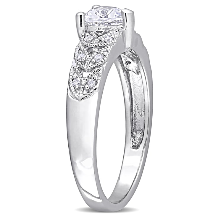 3/5 CT TGW Created White Sapphire and Diamond Accent Vintage Ring in
Sterling Silver