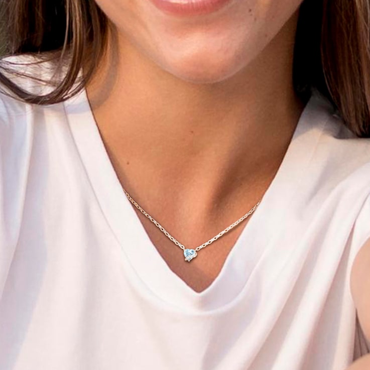 1 CT TGW Sky Blue Topaz and Diamond Accent Heart Swirl Necklace in
Sterling Silver