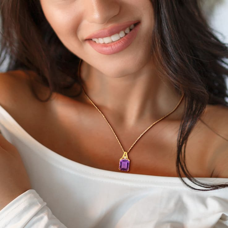 5 CT TGW Amethyst and White Topaz Pendant with Chain in Yellow Plated
Sterling Silver