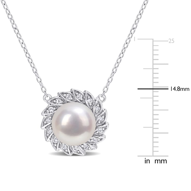 9.5-10MM  Freshwater Cultured Pearl and 1/6 CT TGW Created Sapphire
Pendant in Sterling Silver
