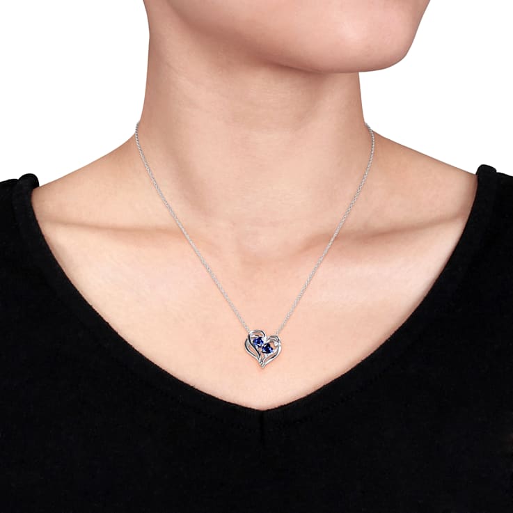 1 1/8 CT TGW Created Blue Sapphire and Diamond Accent Heart Pendant with
Chain in Sterling Silver