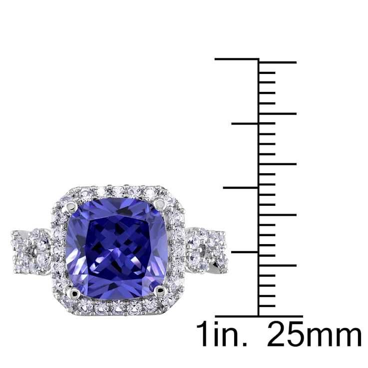 6 3/4 CT TGW Created Tanzanite and Created White Sapphire Halo Ring in
Sterling Silver