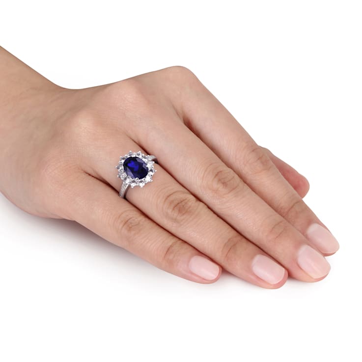 Halo Diamond and 4 CT TGW Created Blue and White Sapphire Ring in
Sterling Silver