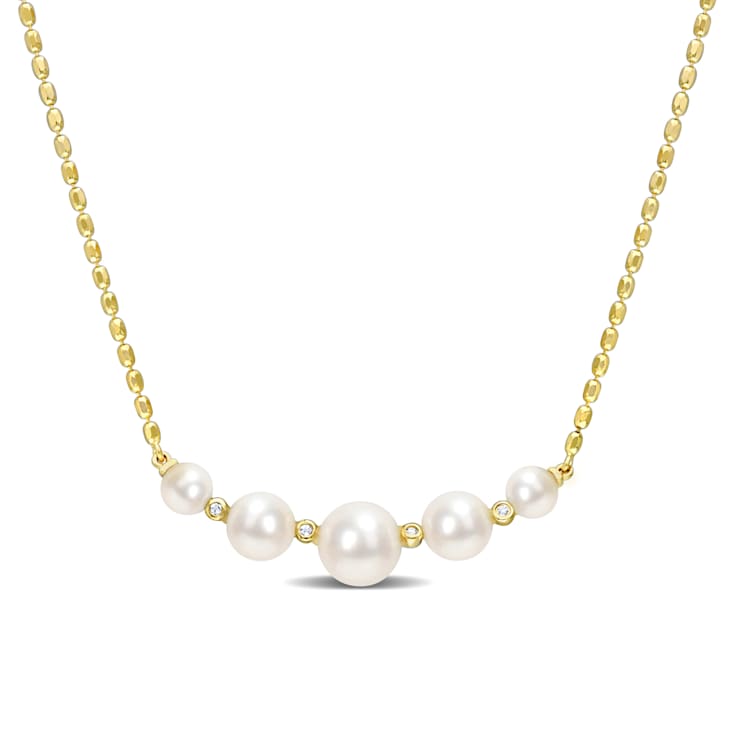 4.5-8 MM Freshwater Cultured Pearl And White Topaz Necklace in 18K
Yellow Gold Over Sterling Silver