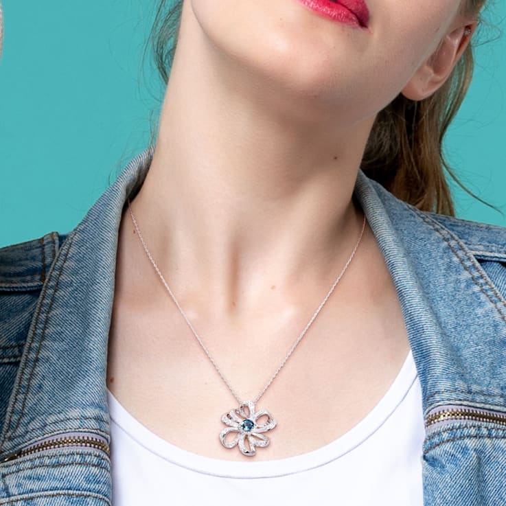 2 1/4 CT TGW London Blue and White Topaz Flower Pendant with Chain in
Sterling Silver