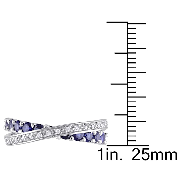 1 CT TGW Created Blue Sapphire and 1/10 CT TW Diamond Crossover Ring in
Sterling Silver