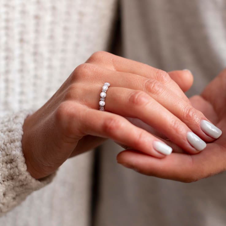 3.5-4MM Freshwater Cultured Pearl and 1/8 CT TGW White Topaz Semi
Eternity Ring in Sterling Silver