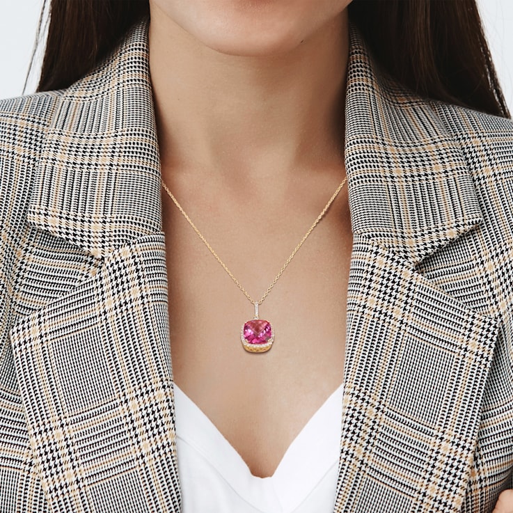 8 3/8 CT TGW Pink Topaz and White Sapphire Halo Pendant with Chain in
Yellow Plated Sterling Silver
