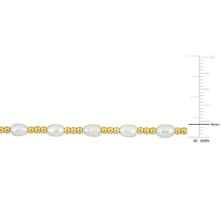 3.5-5MM Freshwater Cultured Pearl Station Bead Bracelet in Yellow Plated
Sterling Silver