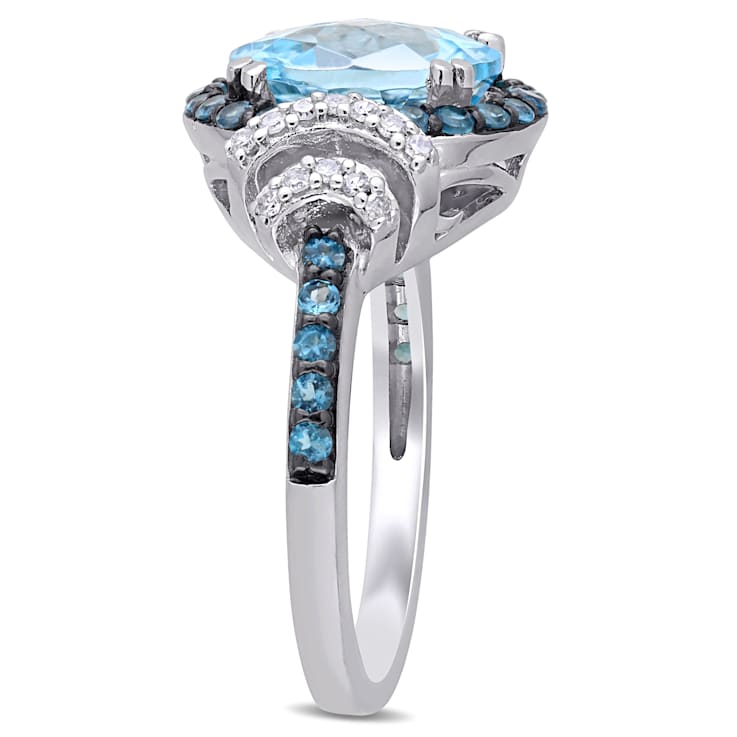 4 4/5 CT TGW London Blue and Sky Blue Topaz with 1/8 CT TW Diamond Halo
Ring in Sterling Silver
