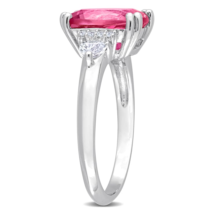 4 1/2 CT TGW Pink Topaz, White Topaz and Diamond Accent 3-Stone Ring in
Sterling Silver