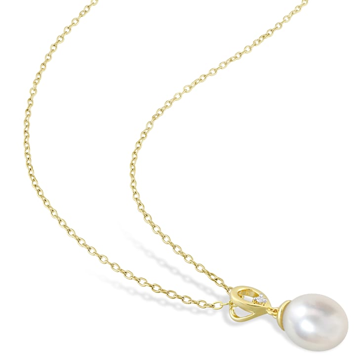 8-9MM South Sea Cultured Pearl & White Topaz Earrings & Pendant
Set in Yellow Plated Sterling Silver