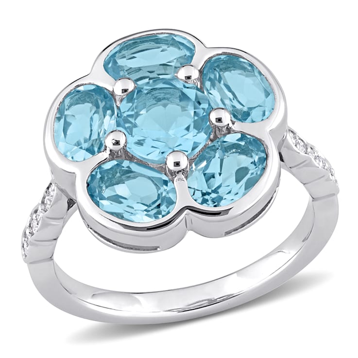 3 1/3 CT TGW Sky Blue Topaz and Diamond Accent Floral Ring in Sterling Silver
