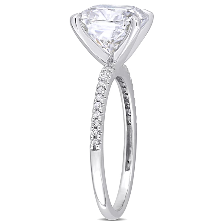 3-1/2 CT DEW Created Moissanite and 1/10 CT TW Diamond Engagement Ring
in 14K White Gold