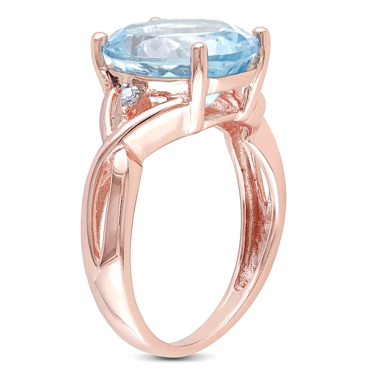 5 1/2 CT TGW Sky Blue Topaz and Diamond Accent Twist Ring in Rose Plated
Sterling Silver