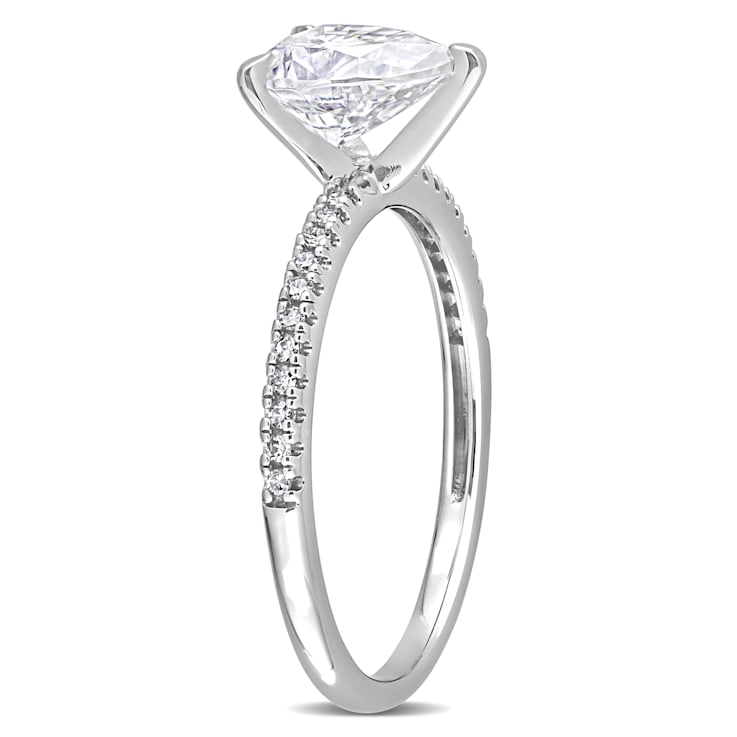 1-1/4 CT DEW Created Moissanite and 1/10 CT TW Diamond Engagement Ring
in 14K White Gold