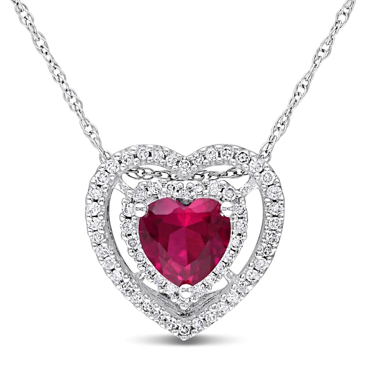 1 CT TGW Created Ruby and 1/5 CT TW Diamond Double Halo Heart Pendant
with Chain 10K White Gold